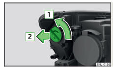 Fig. 209 Cambiar la bombilla para luz de marcha diurna